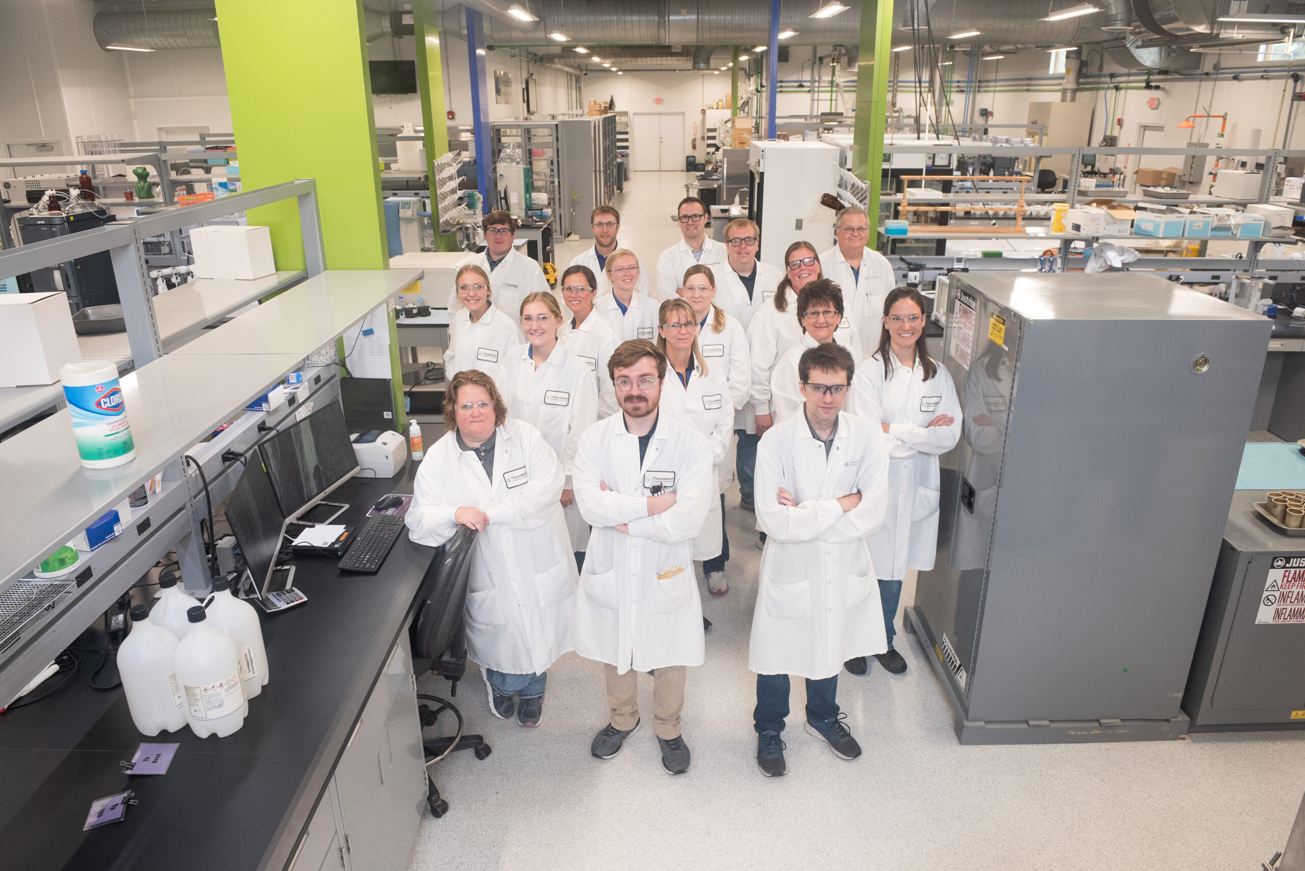 The Foundation Analytical Laboratory staff pose for a team photo in the lab.